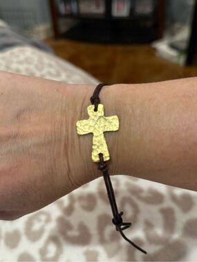 Hammered Gold Cross Bracelet on Brown Cord